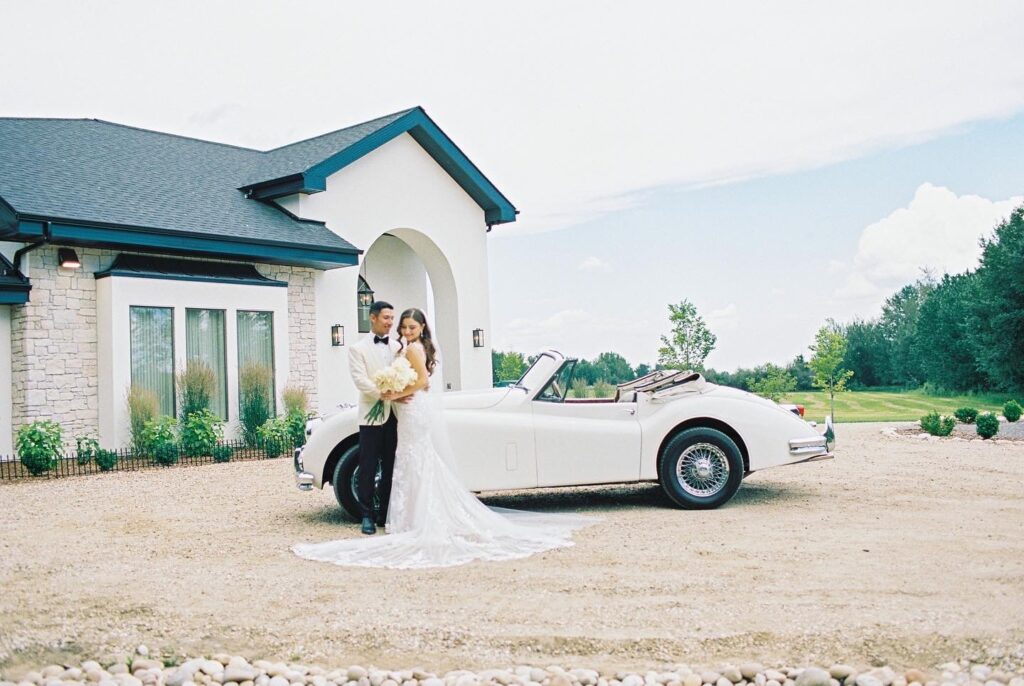 Bride and Groom photo in front of Alberta Wedding Venue Sparrow Lane Events